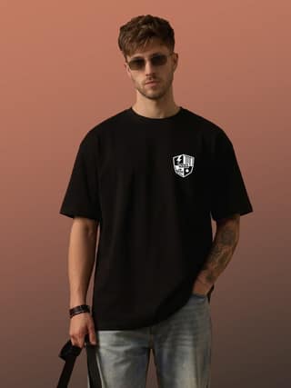 The Retro India Black Oversized Cotton T-Shirt for Men with Minimal NXR Logo | Premium Streetwear Solid Tee | Soft Breathable Fabric Casual Trendy Loose Fit Designer Wear