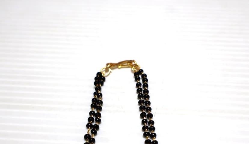 Elegant Gold-Plated Mangalsutra with Black Beads and Gemstone Pendant view 4