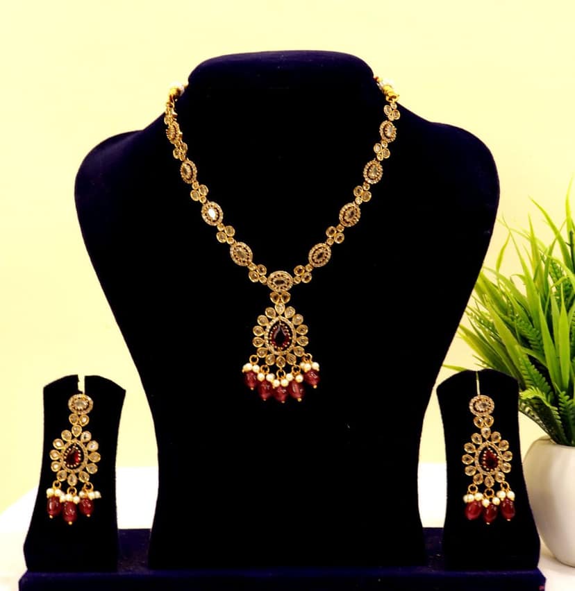 Gold Plated Kundan Necklace Set With Maroon Stones