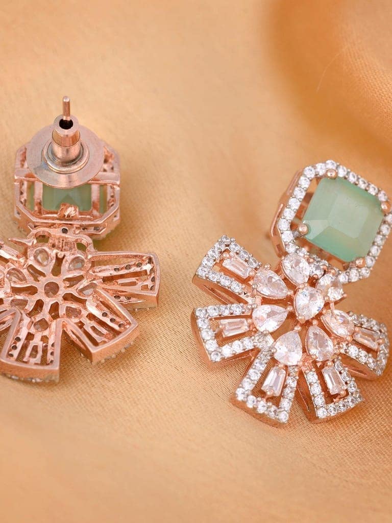 Exquisite Turquoise Floral design pastel blue earrings Rose gold plated AD studded view 4