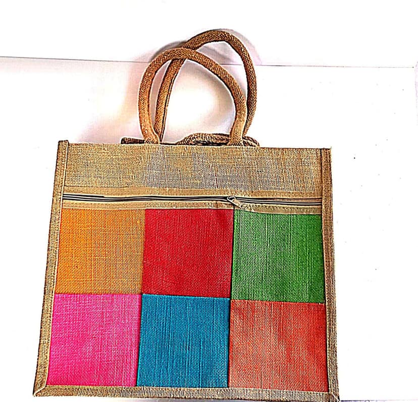 Jute tote bag with zipper closure and colorful patchwork design
