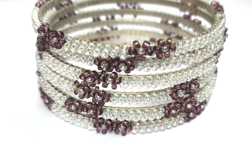 white and brown floral beads Bangles