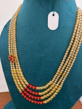 4 line golden pearl necklace with red beads for wedding and party wear