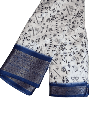 A beautiful handloom cotton saree with Warli hand-painted designs and a contrast blue border.