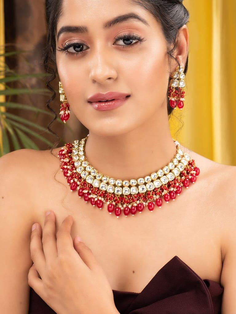 Gold Toned Kundan & Red Bead studded Handcrafted Jewellery Set view 2