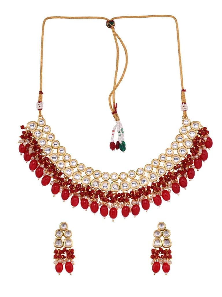 Gold Toned Kundan & Red Bead studded Handcrafted Jewellery Set view 3