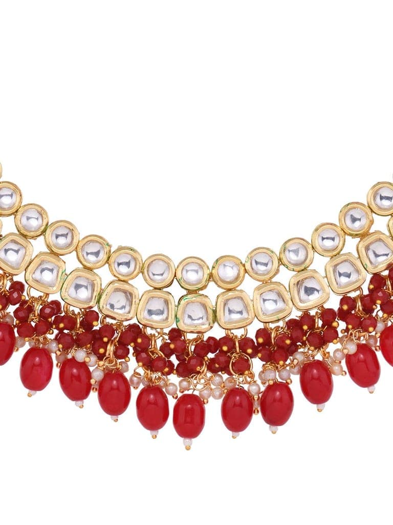 Gold Toned Kundan & Red Bead studded Handcrafted Jewellery Set view 4