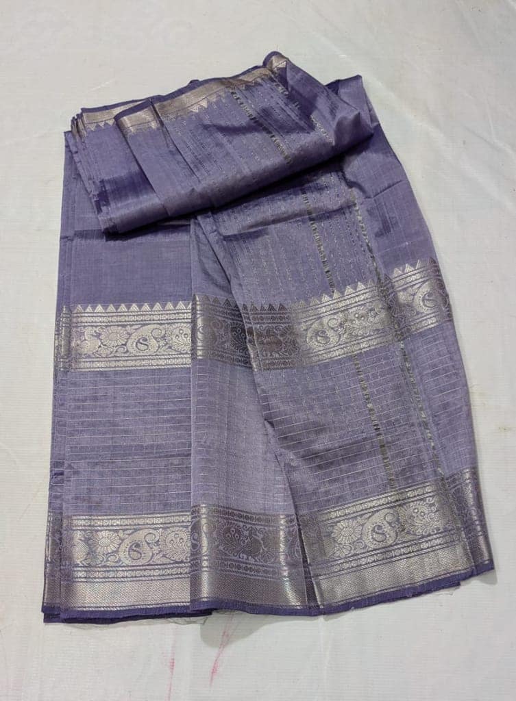 A beautiful, traditional Indian silk saree in a deep blue color with silver zari work. view 2