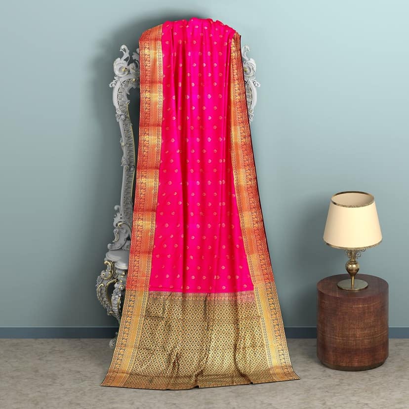 Ruby pink body with zari worked border 1000 buttas semi silk saree. view 6