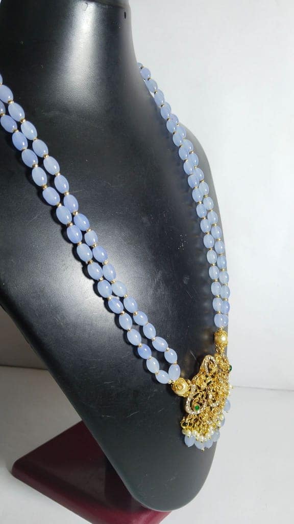 "Stunning and elegant pearl necklace with intricate gold pendant" view 3