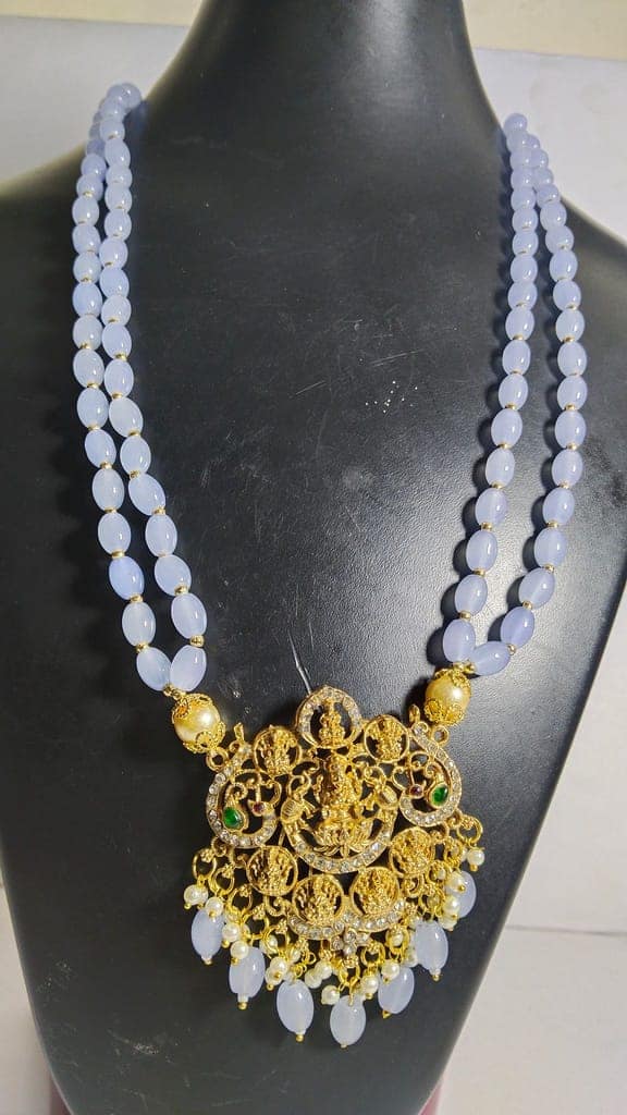 "Stunning and elegant pearl necklace with intricate gold pendant" view 4