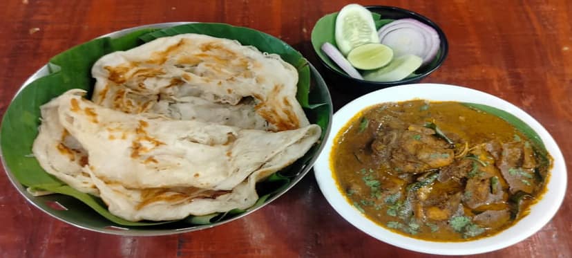 Kerala porotta with chicken curry and salad combo