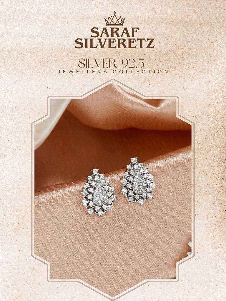 925 Sterling Silver Rhodium Plated Cubic Zircon Pear Shaped Studds Earrings view 3
