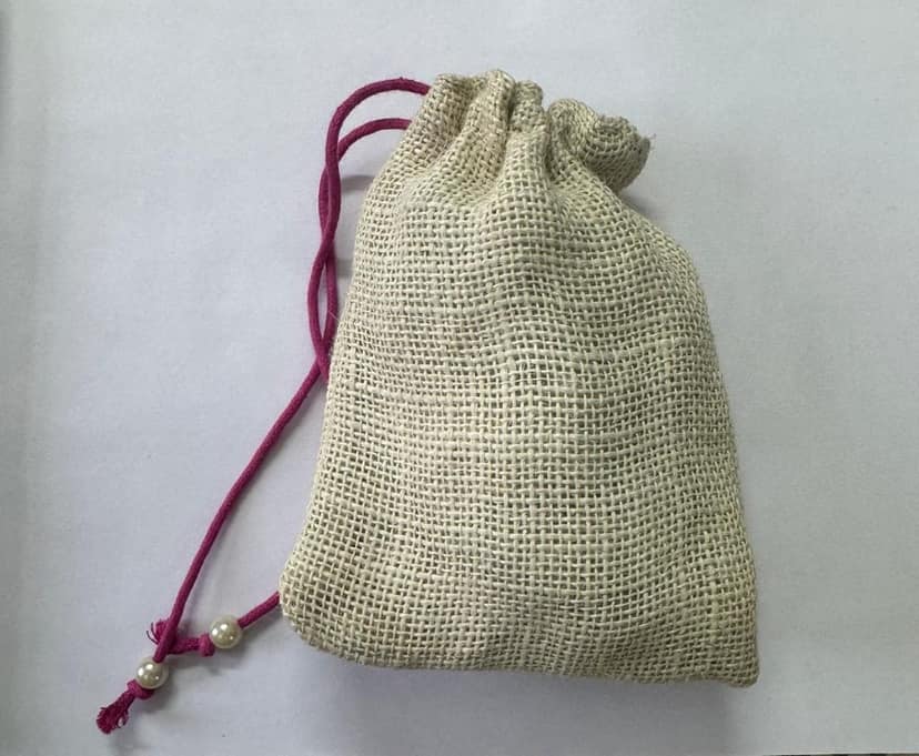 Multicolored embroidered jute potli