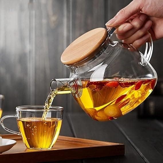 Glass Teapot with Wooden Lid, 1000 ML, Set of 1, Kettle with Glass Handle, Perfect for Loose Leaf Tea & Blooming Coffee Maker, Safe On Stovetop & Heat-Resistant But Hand Washing is Recommended.