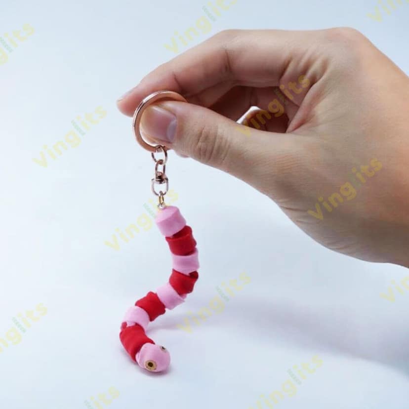 Vinglits Bugsy & Scaly 3D Printed Keychains – Articulated Animal Toys, Pocket-Friendly Keyrings, Stress Relief Desk Toys for Kids & Adults, Collectible Accessories (Worm - Jumpy, Medium) view 3