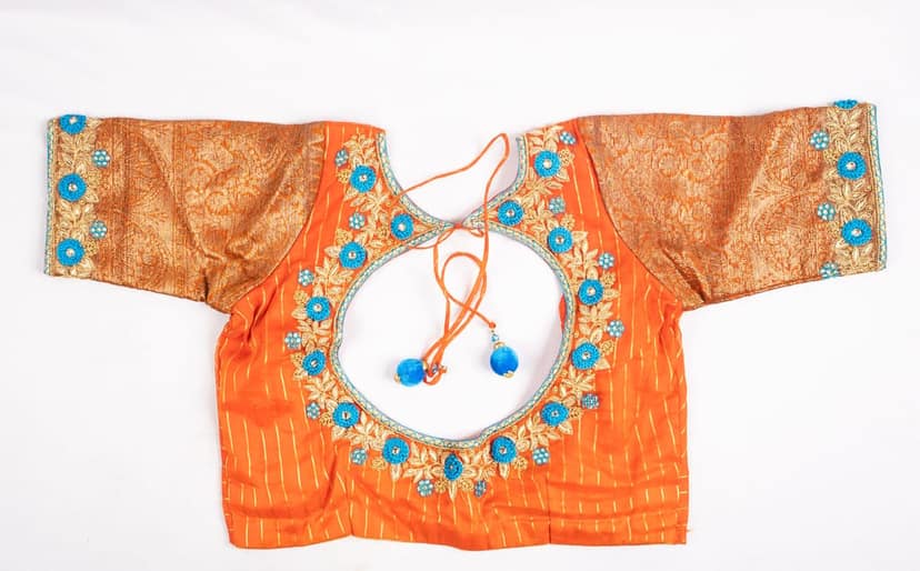 Orange and gold embroidered boat neck blouse