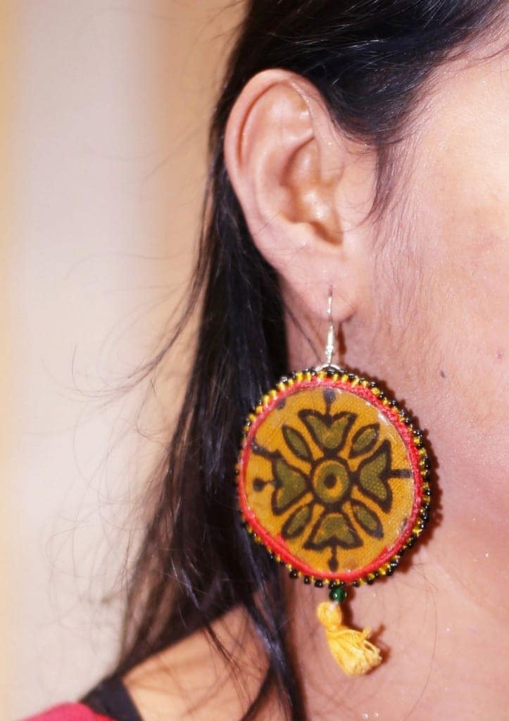 Yellow round beaded floral earrings view 3