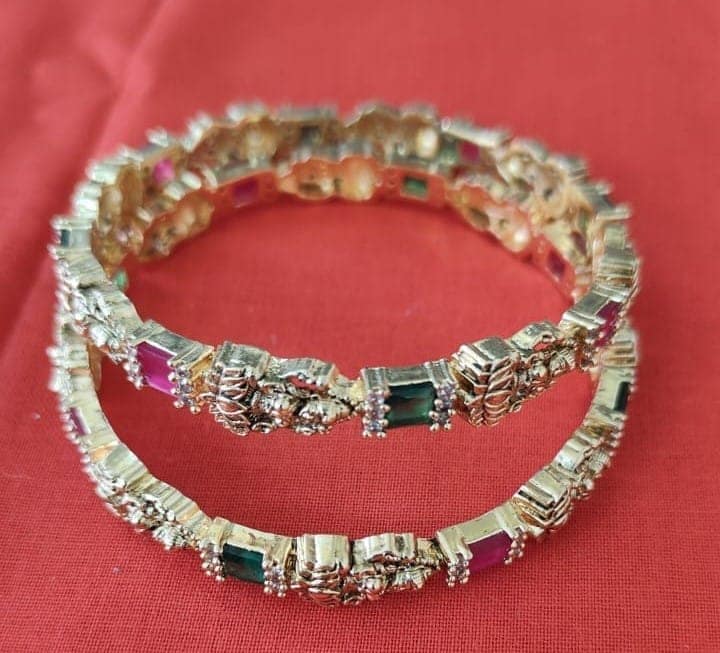 Gold Plated Goddess Laxmi Engraved Bangle Set with Green and Pink Stones view 3