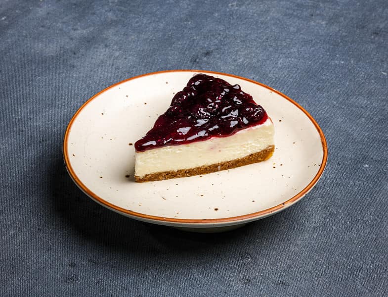 Blueberry baked cheesecake slice