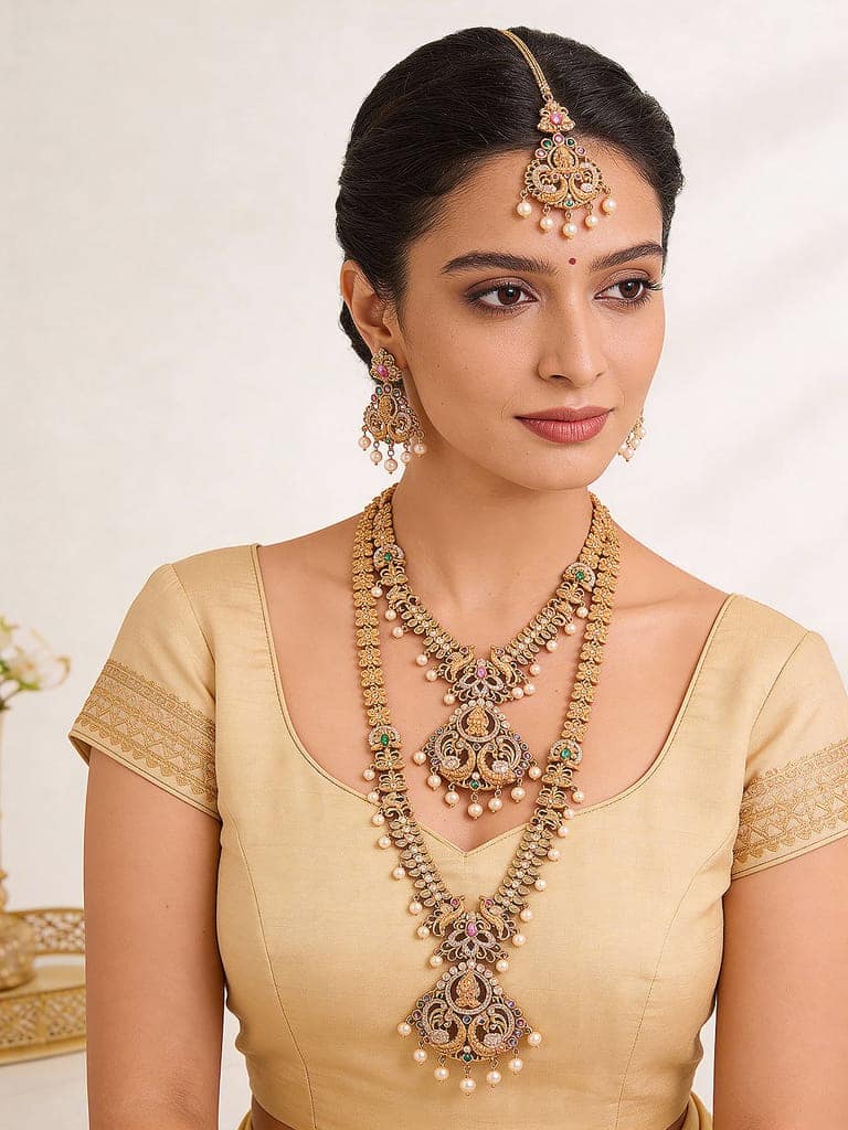 Combo Gold Plated White AD & Pearl Studded Temple Lakshmiji Bridal Jewellery Set view 5