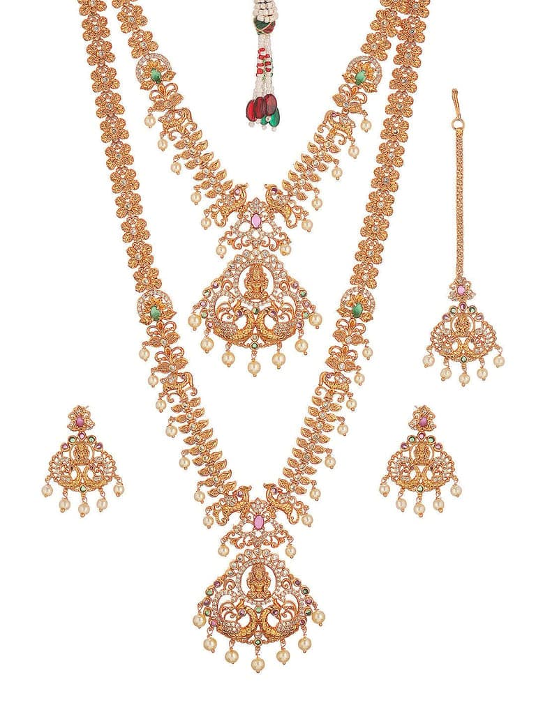 Combo Gold Plated White AD & Pearl Studded Temple Lakshmiji Bridal Jewellery Set view 8