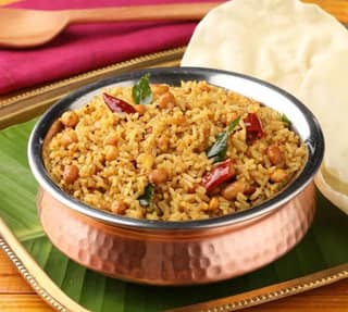 Puliyotharai Rice with Plain Egg