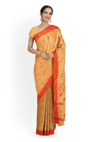 A Cream And Orange Base Handloom Saree