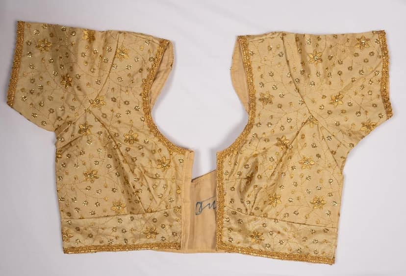 Blouse with golden embroidery