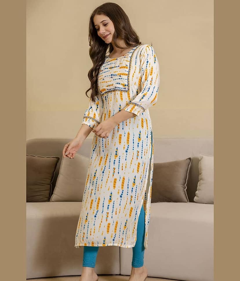 Kapadia Women Viscose Rayon Embroidered Straight Kurti ( Beige )