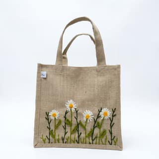 HAND EMBROIDERED DAISY JUTE HANDBAG