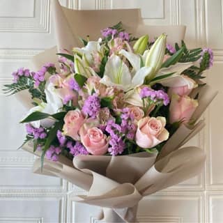The Blooming Story Soberness in Gifting White Oriental Lily Purple Statice Pink Rose Bouquet
