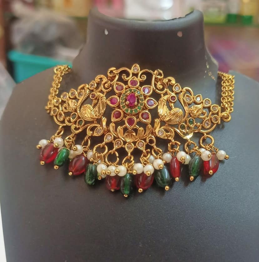 Stunning antique gold choker necklace with intricate filigree work and colorful gemstones. view 2