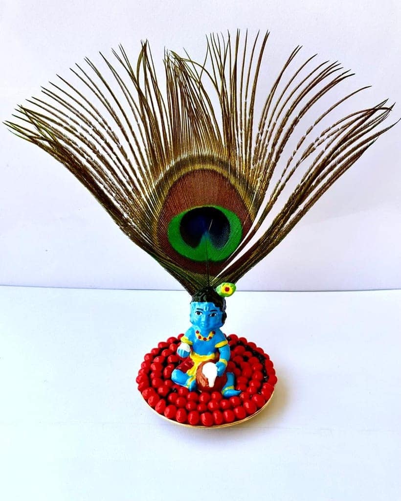 Guruvayoor Lord Krishna Idol with Peacock Feather and Kunnikuru Beads