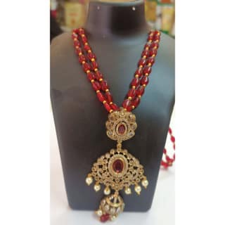 Maroon Beaded Necklace with Ornate Gold Pendant