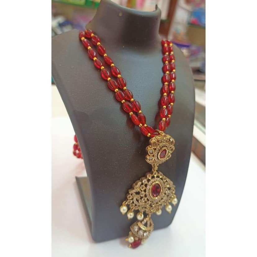Maroon Beaded Necklace with Ornate Gold Pendant view 3