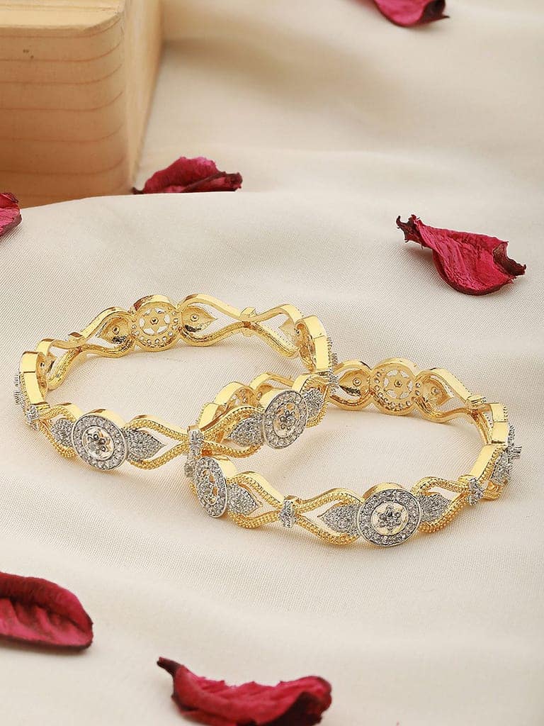 Set Of 2 Dua Toned Gold Plated Whitee AD Studded Handcrafted Leafy Design Bangles