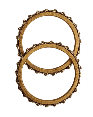 "Exquisite Golden Bangle Set with Intricate Stone Detailing - Perfect for Traditional Occasions"