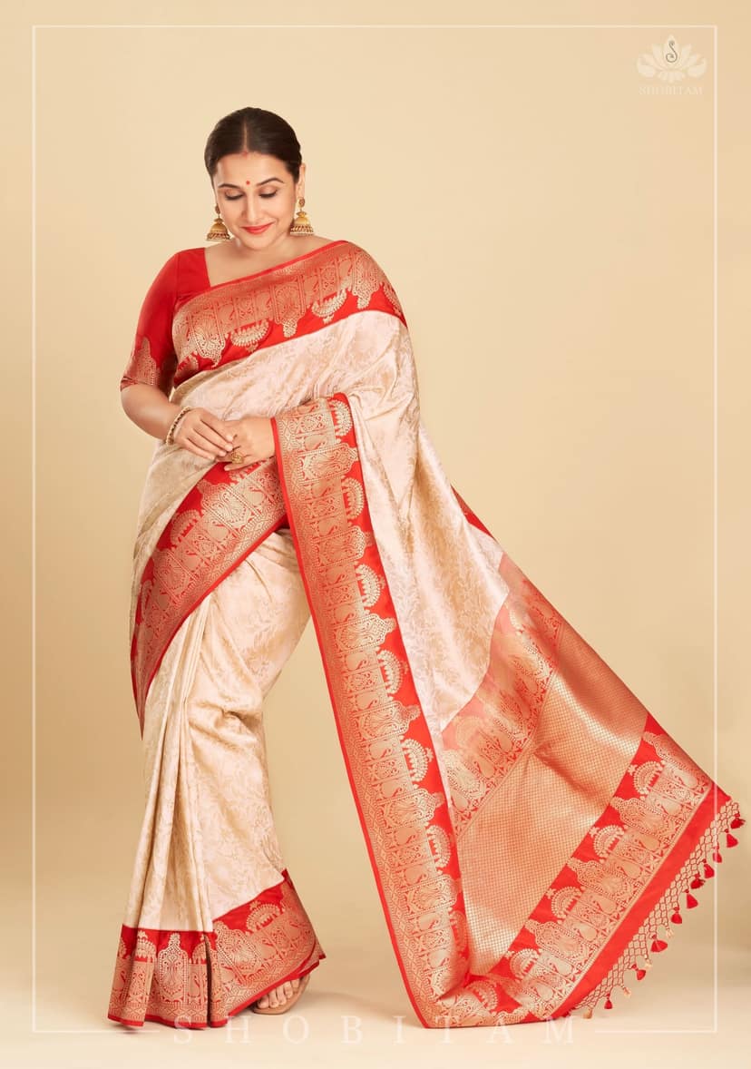 Exquisite Celebrity Brocade Banarasi Pure Katan Silk Saree in Ivory, Red & Gold with Dome Shaped Kadhiyal Borders | SILK MARK CERTIFIED view 2
