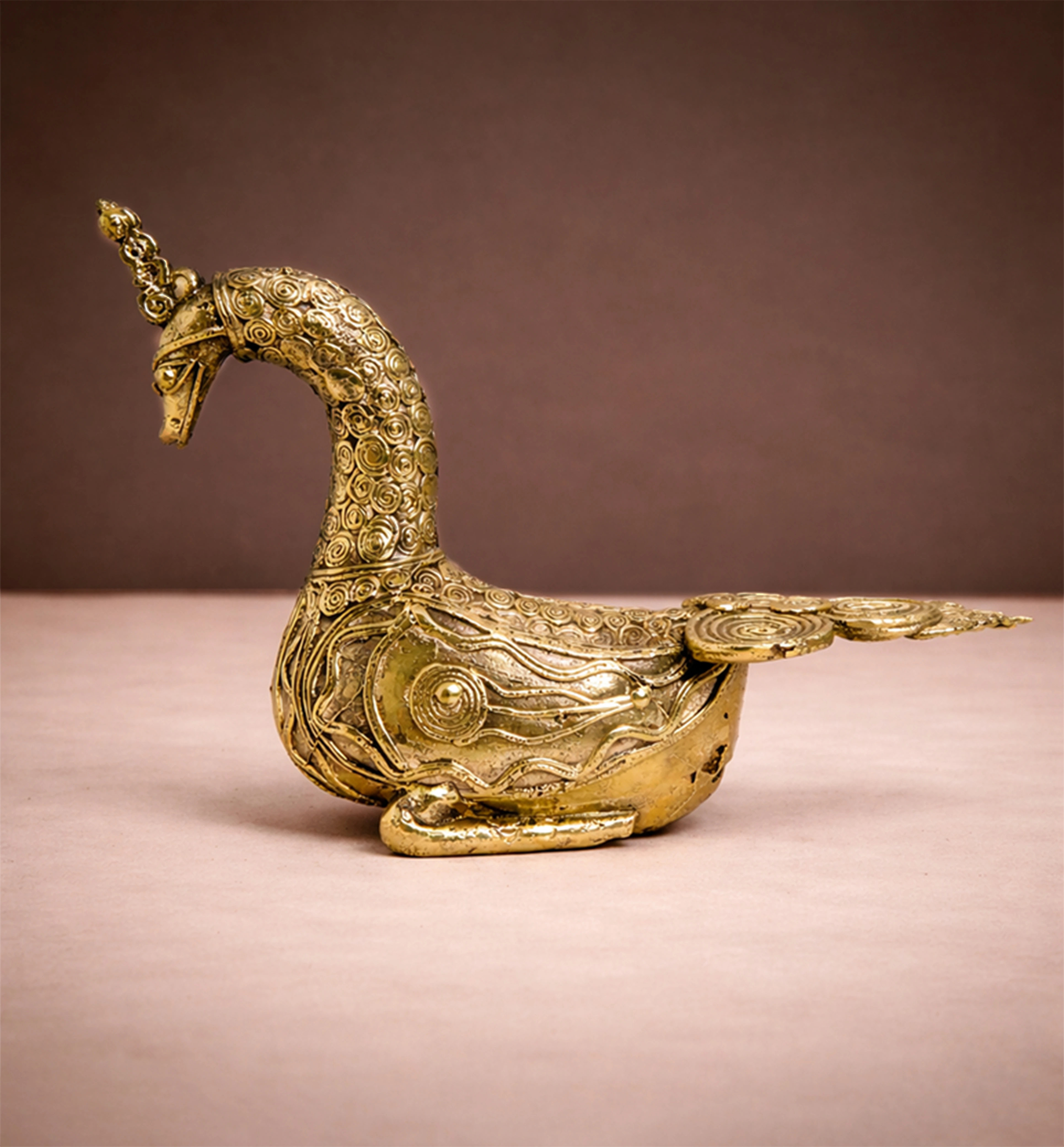 Handcrafted Brass Sitting Peacock Sculpture – Traditional Bhareva Bell Metal Artefact