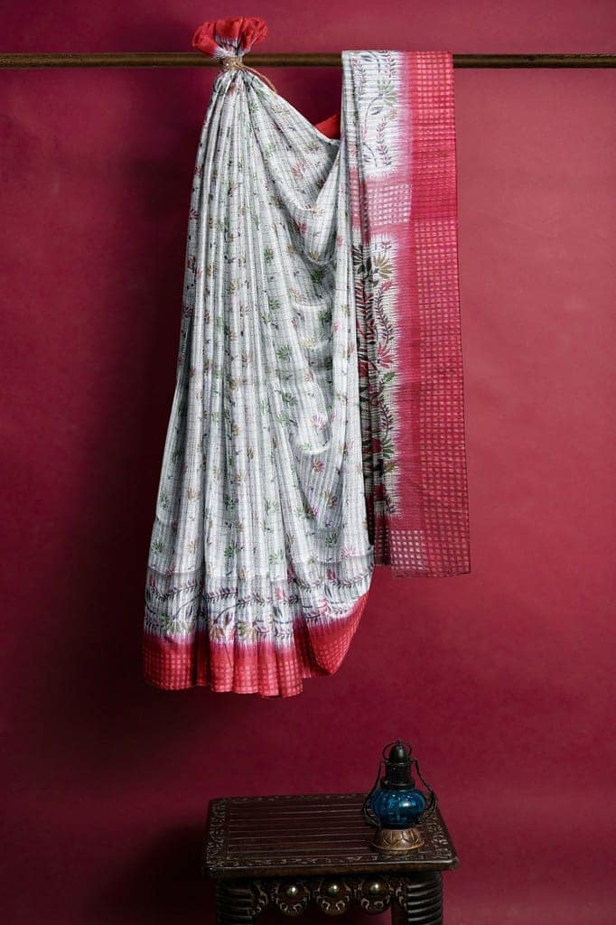 A Handloom Saree On A Grey Base And A Red Border view 2