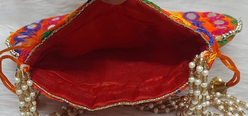 Vibrant Orange Embroidered Sequin Potli Bag with Pearl Handle view 3