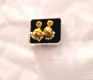 Pearl and gold jhumka earrings