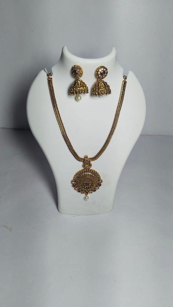 Gold-plated Kundan and Pearl Necklace Set with Earrings