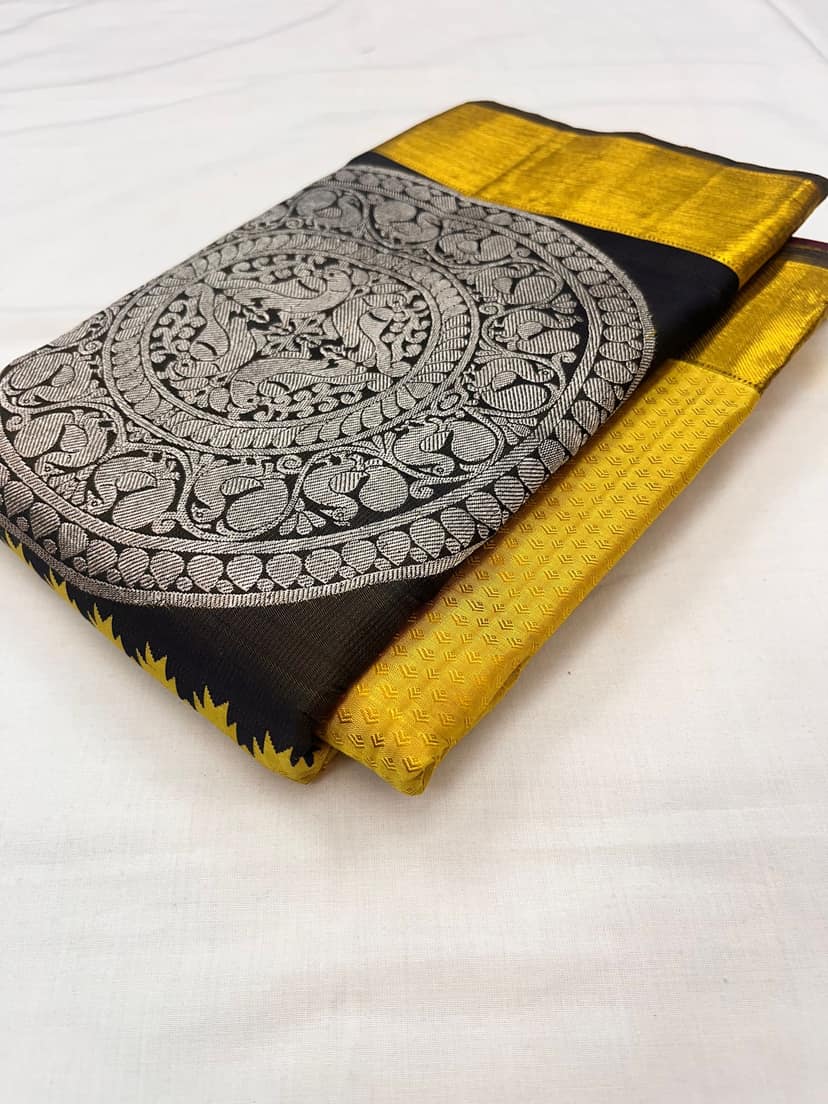 Yellow With Blue Color Long Border Kanjivaram Pure Silk Saree Has Pink Color Center Pleats view 5