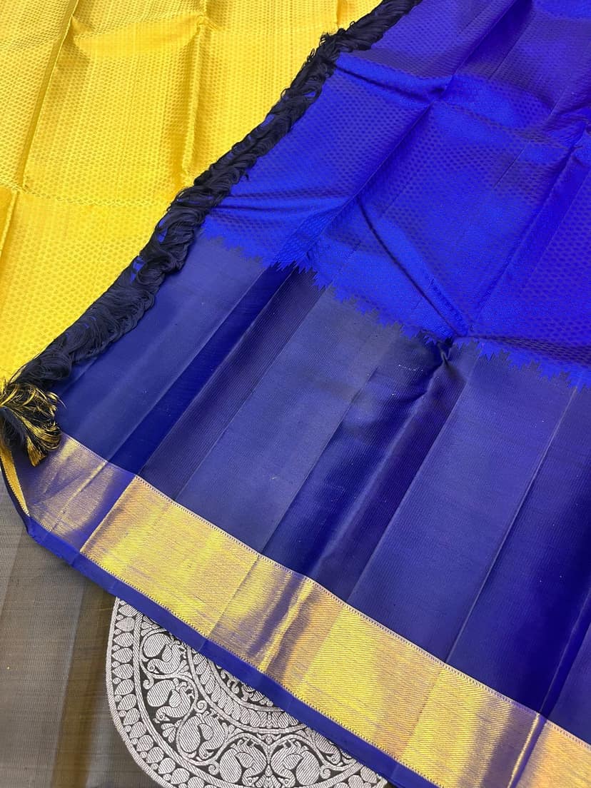 Yellow With Blue Color Long Border Kanjivaram Pure Silk Saree Has Pink Color Center Pleats view 6