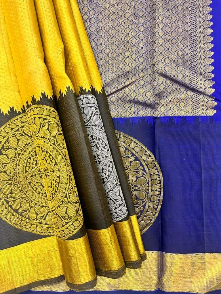 Yellow With Blue Color Long Border Kanjivaram Pure Silk Saree Has Pink Color Center Pleats view 7