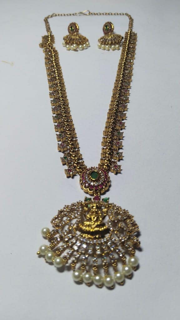 "Stunning Lakshmi Pendant Necklace Set with Earrings in Gold Plated Alloy" view 3
