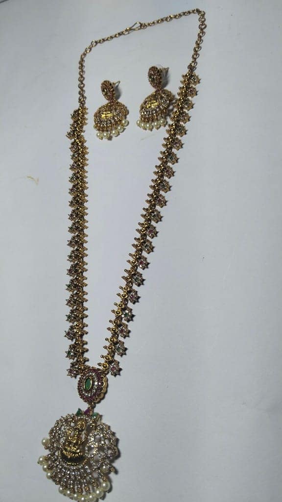 "Stunning Lakshmi Pendant Necklace Set with Earrings in Gold Plated Alloy" view 5