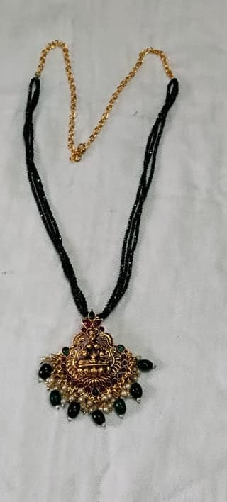 oxidized finish temple pendant with Dark green beads chain